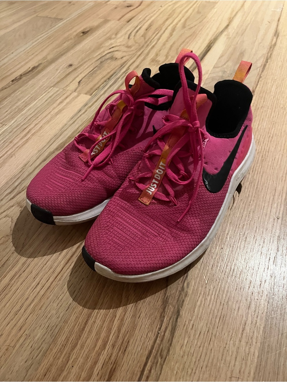 Nike Women's Hot Pink Running Shoes with Black Swoosh